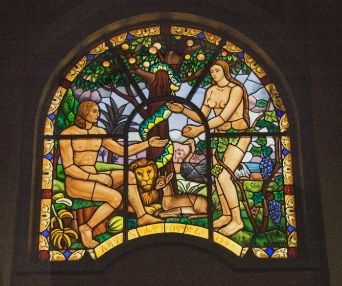 this is an old stained glass window depicting the bible