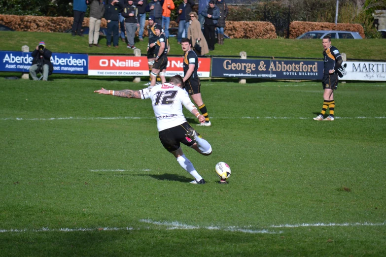 some men in action on the soccer field