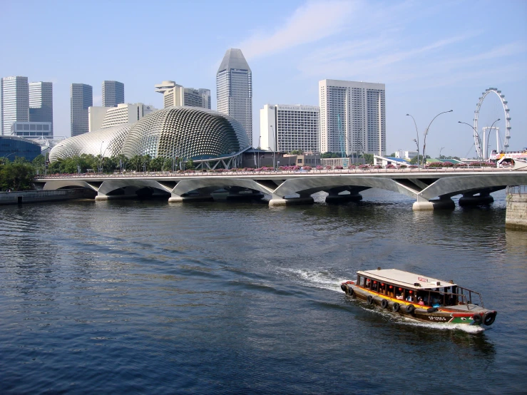 a long boat is traveling across the water