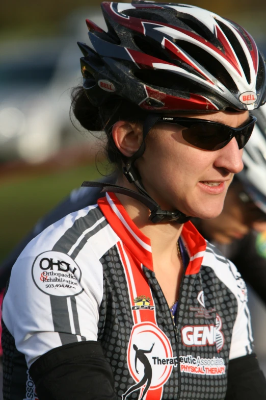 a closeup of an olympic cyclist wearing goggles