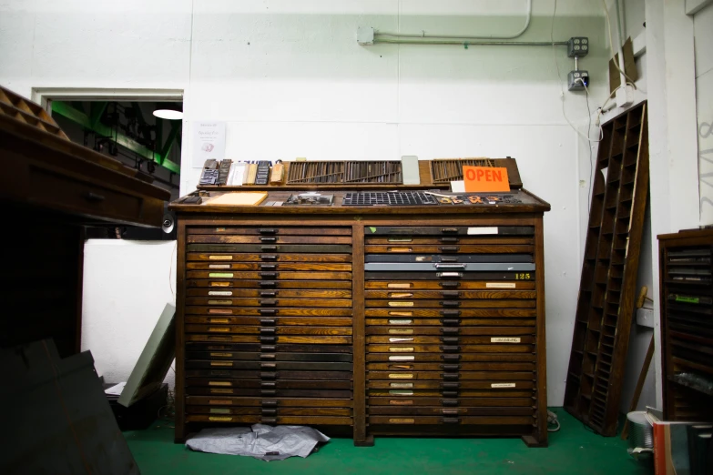 a couple of wood chests sitting on top of a floor