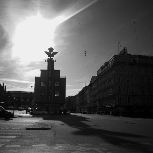 a street with buildings in the background