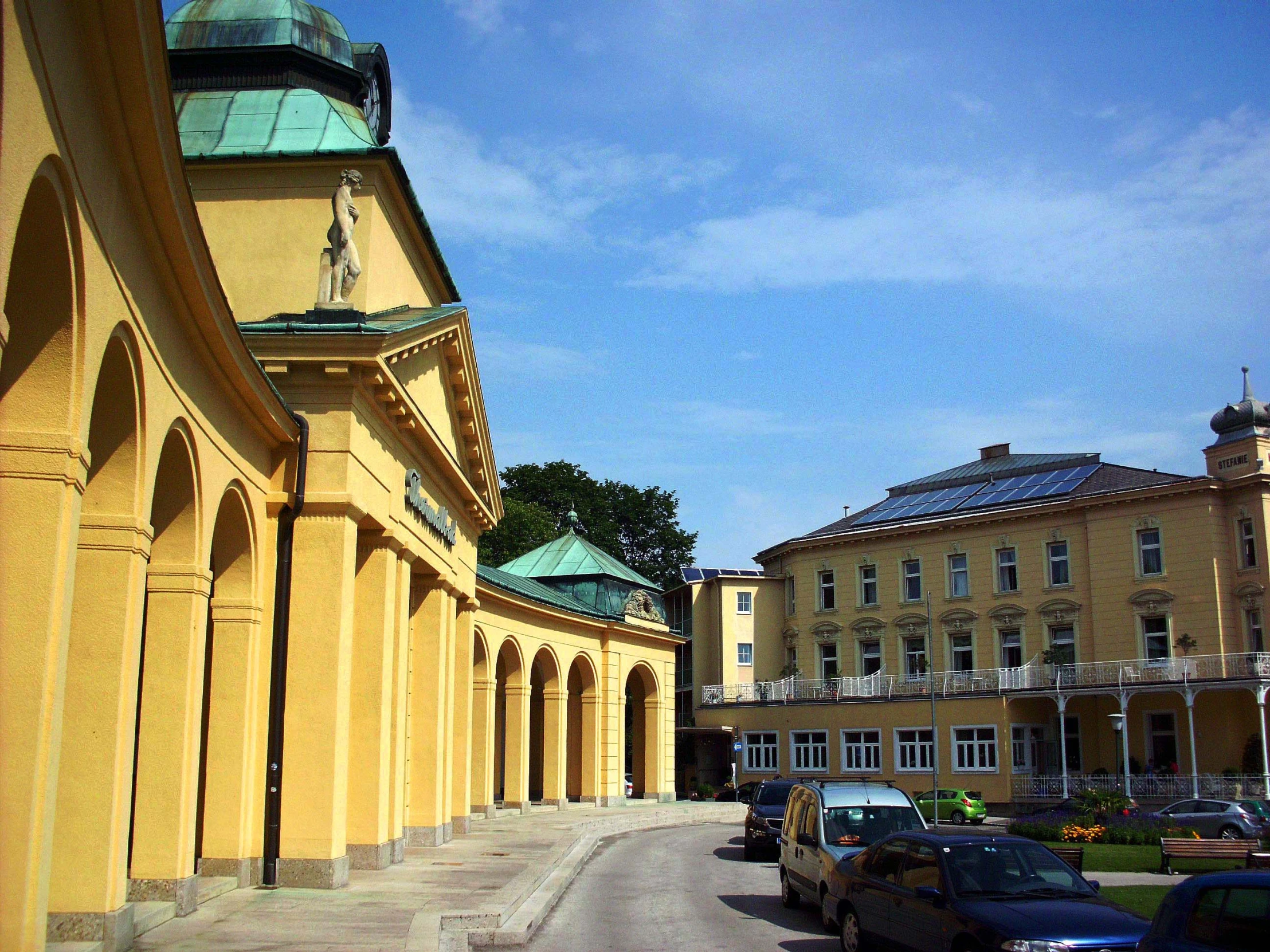 a large building has a clock tower on top