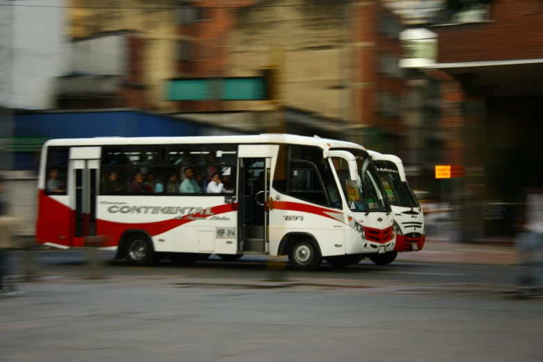 a commuter bus on the road, in a blurry scene