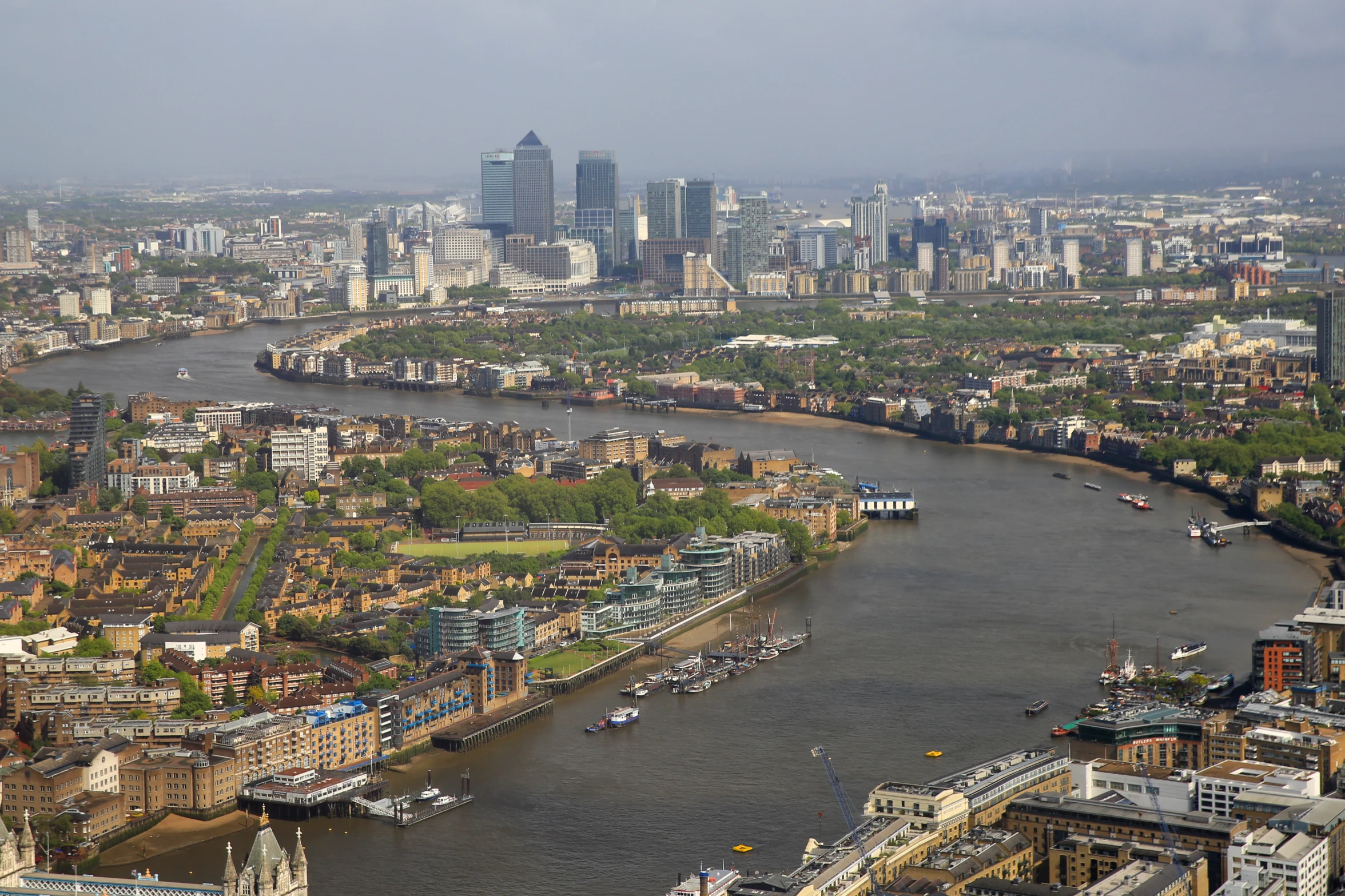 an aerial view of london with lots of river thames