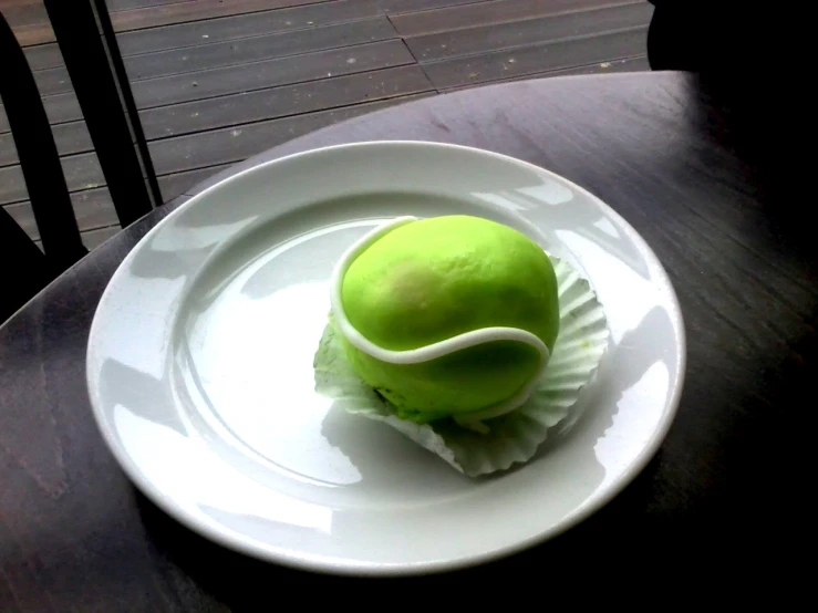 a chocolate dessert with an iced apple inside