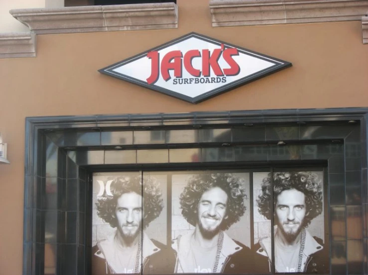 an old sign for jack's super steaks above the window