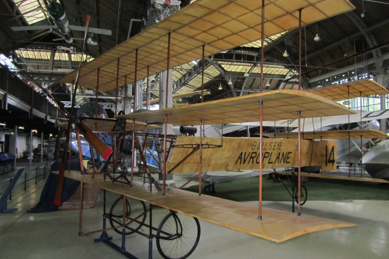 the vintage planes are parked in the hangar