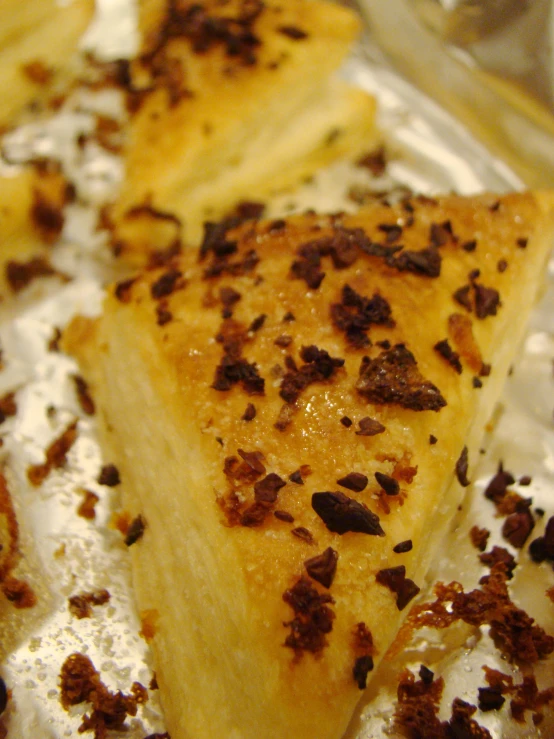 the two pieces of cake have been placed on foil