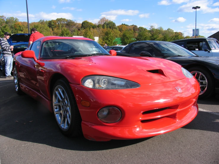 the dodge rx8 is parked in the lot