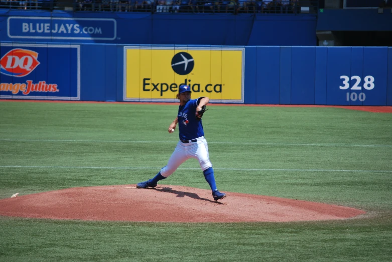 a pitcher is pitching a baseball during a game