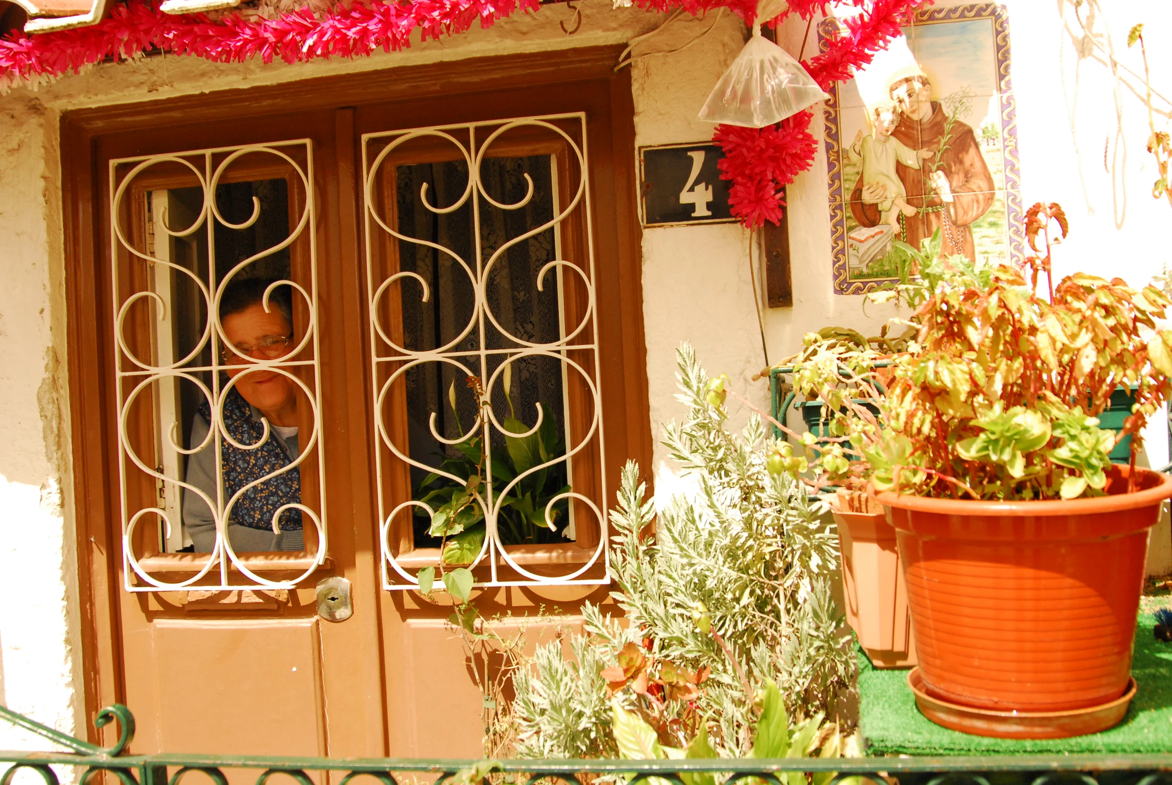 an open patio door on the side of a building