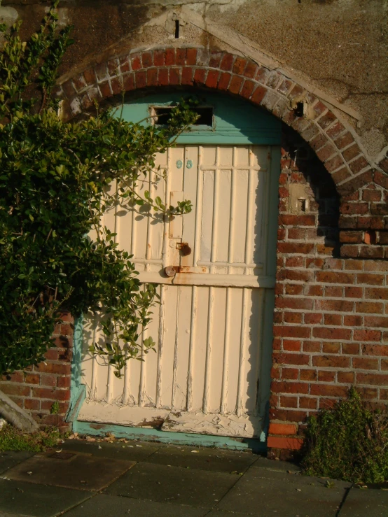 a door that is made from brick and stone