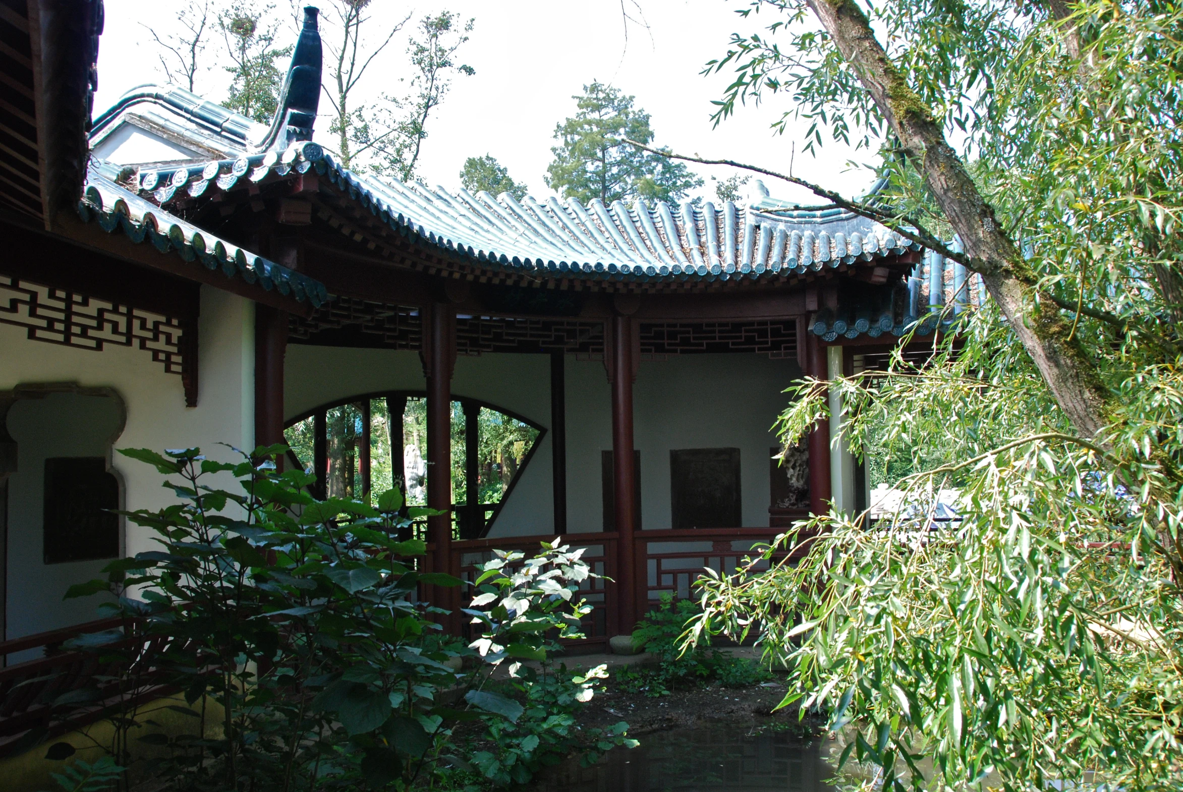 the courtyard has many arches and a garden