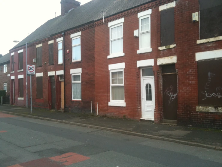 a street that has two white doors on it