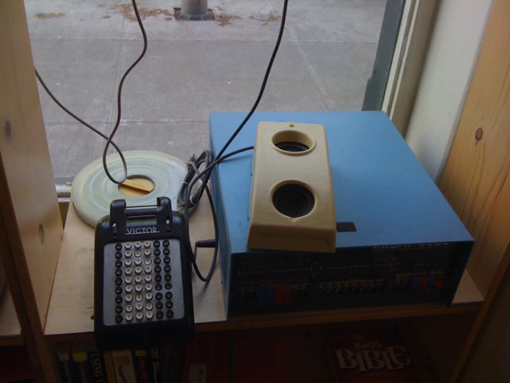 the radio is set next to an electronic device