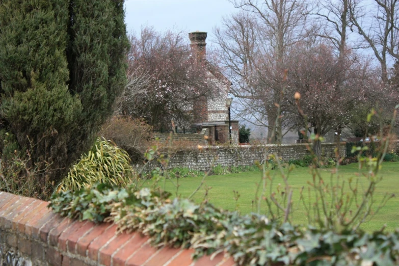 a very big nice looking home with a nice lawn