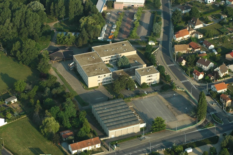 an aerial view of several buildings and the surrounding area