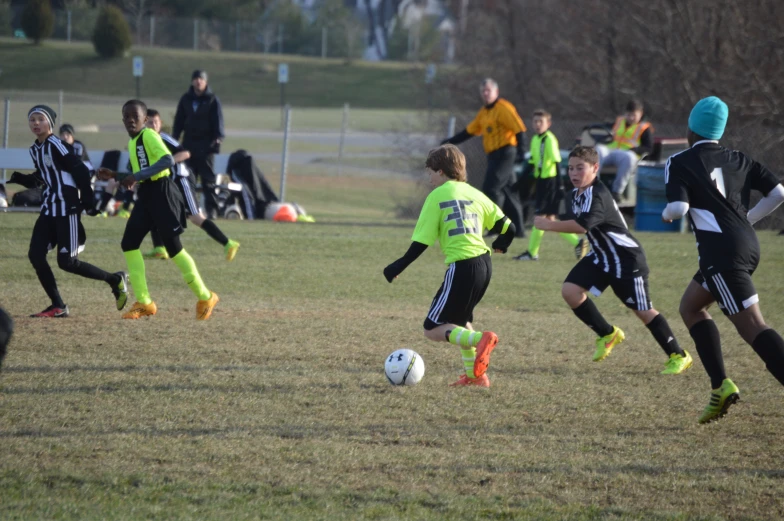 s play soccer against each other in a game