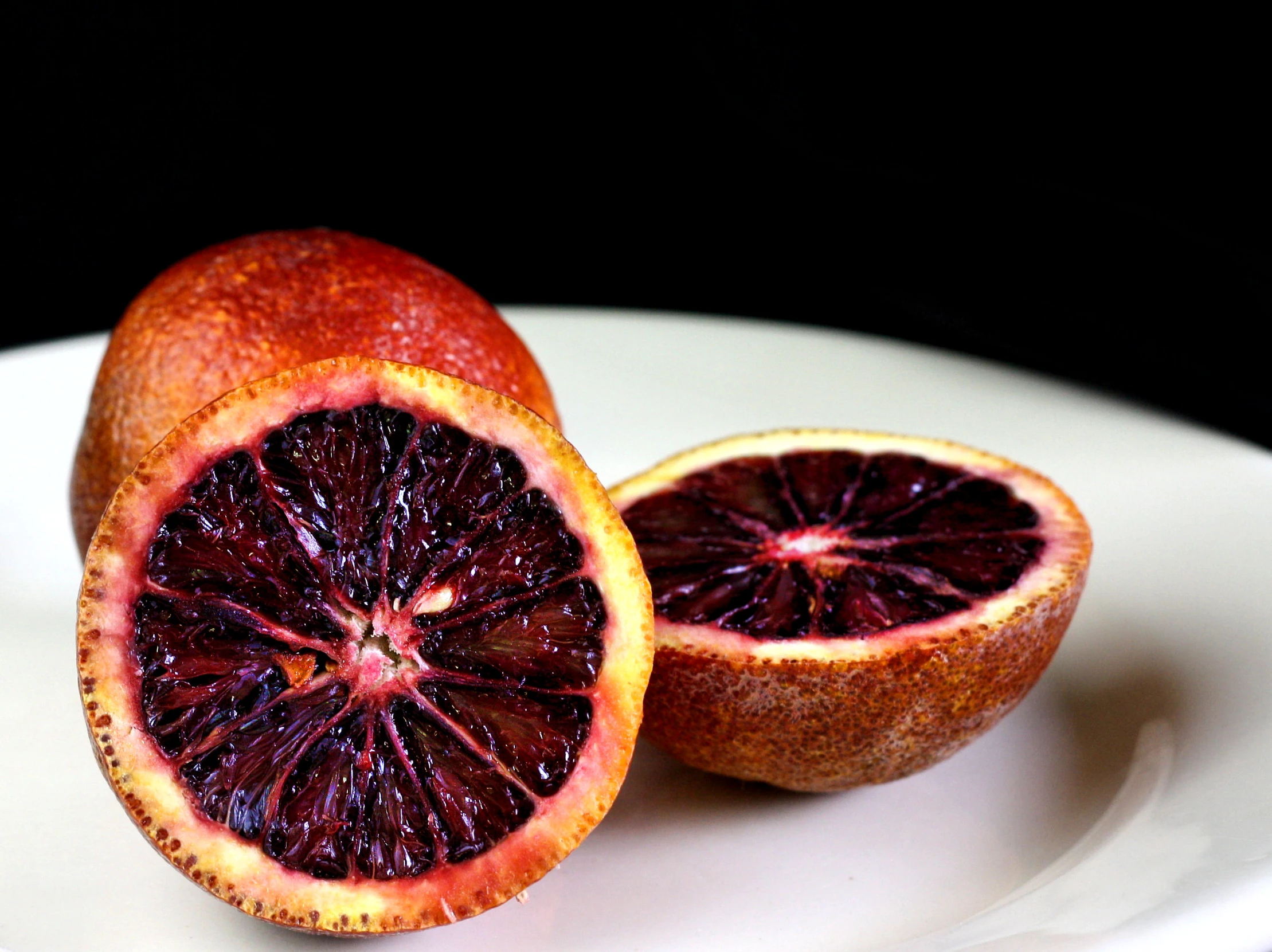 this plate has cut up pieces of a gfruit