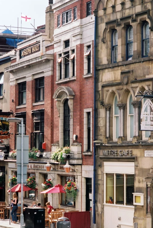 an image of two women walking down a street