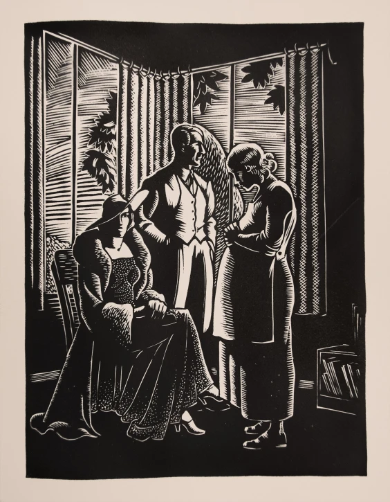 two women and a child in a room with a large window