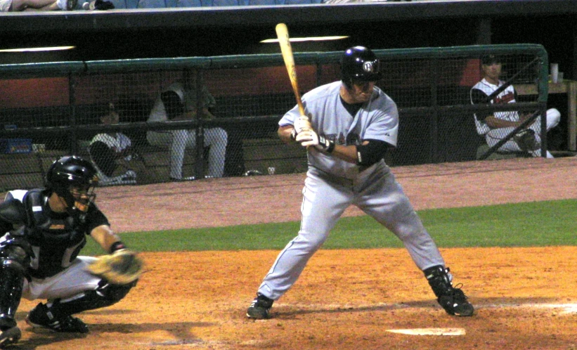 a professional baseball player is getting ready to hit the ball