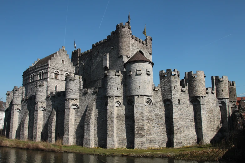 some water a castle and a big building