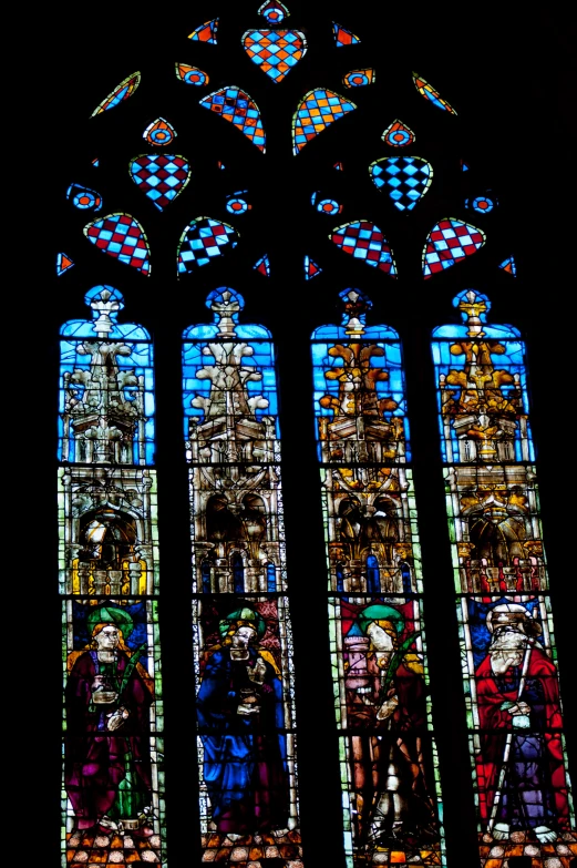 a large stain glass window depicting people