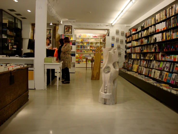 a room that has a book section filled with books