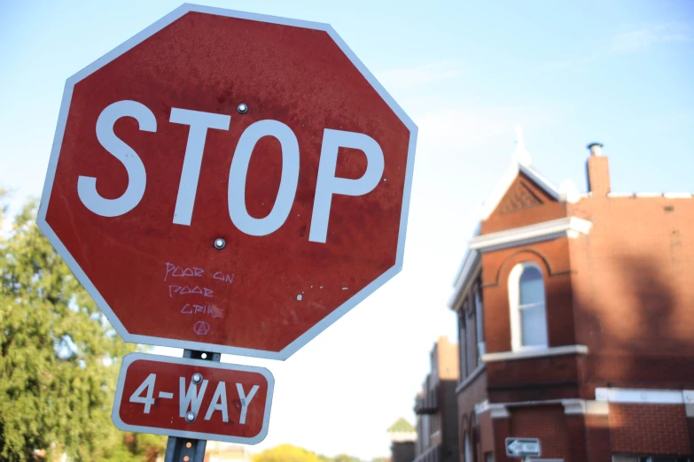 a stop sign on the side of the road