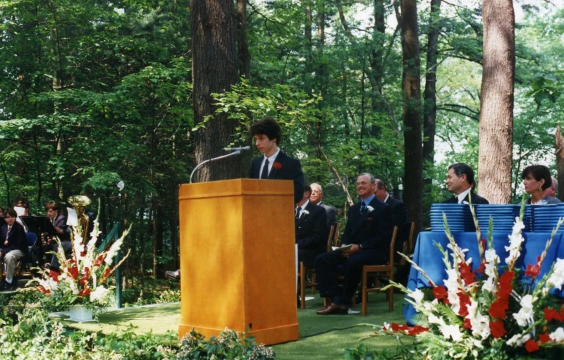 people at a podium with a speaker in front of them