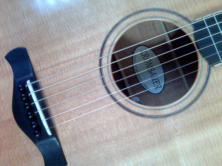 the frra guitar has a curved neck and strings