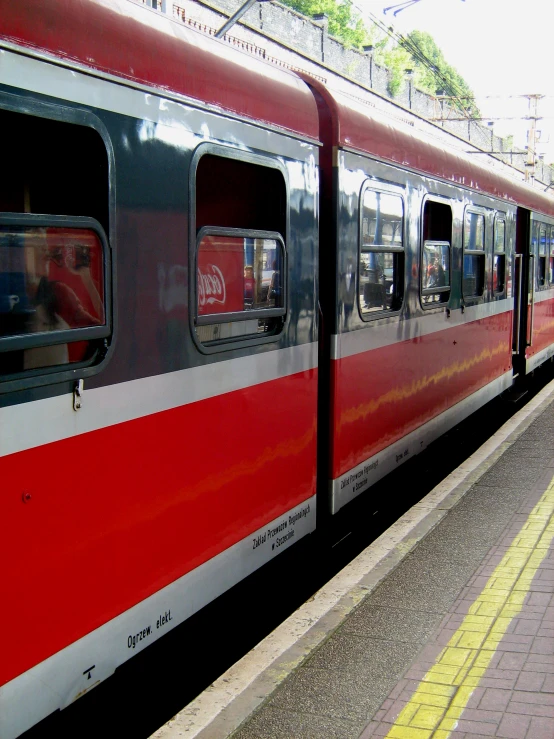 the back side of a train at a station