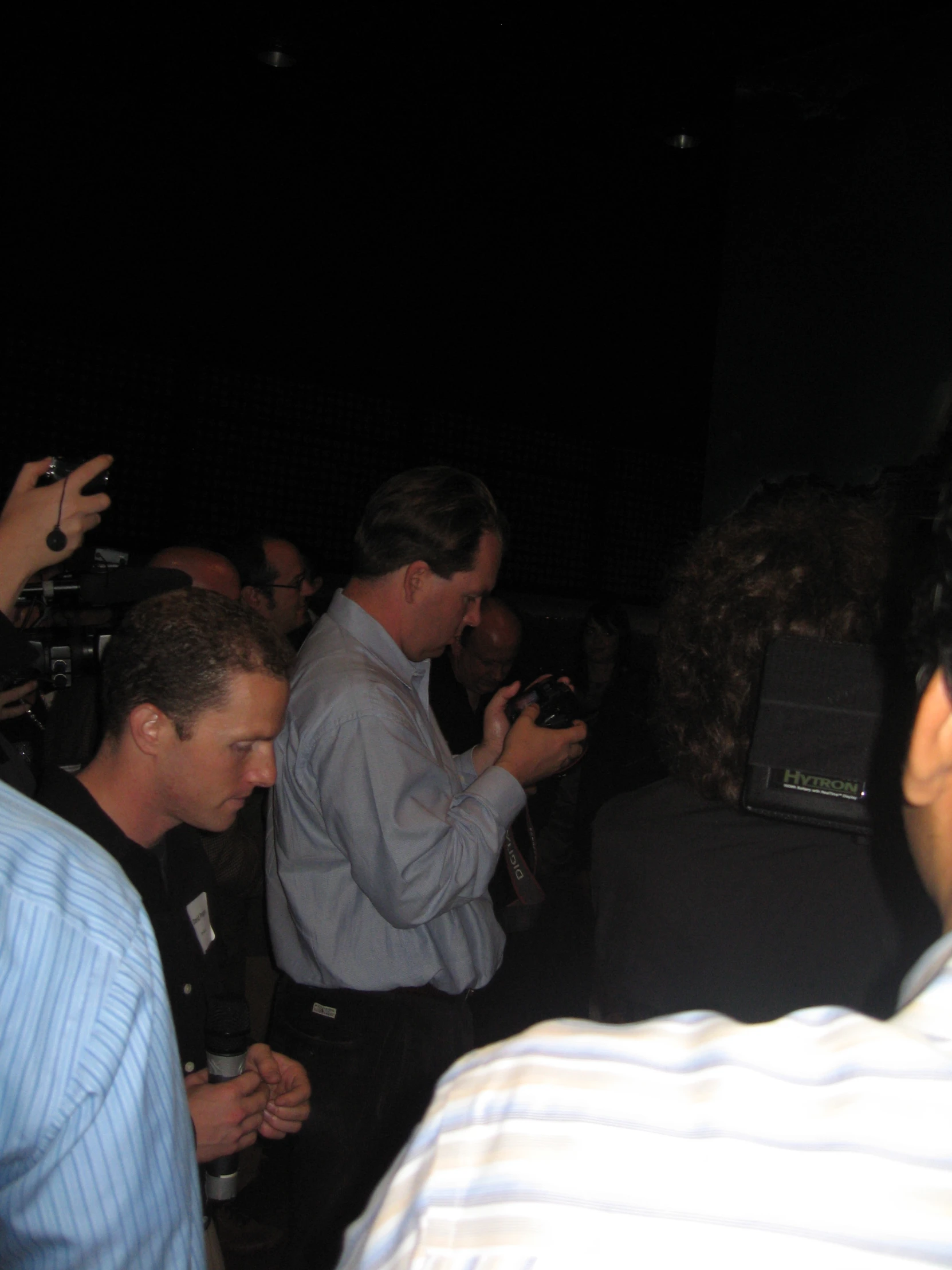 a man using his cell phone during an event