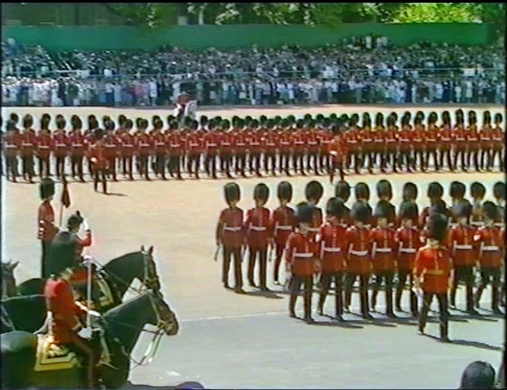 a group of people in uniform with horse and carriages