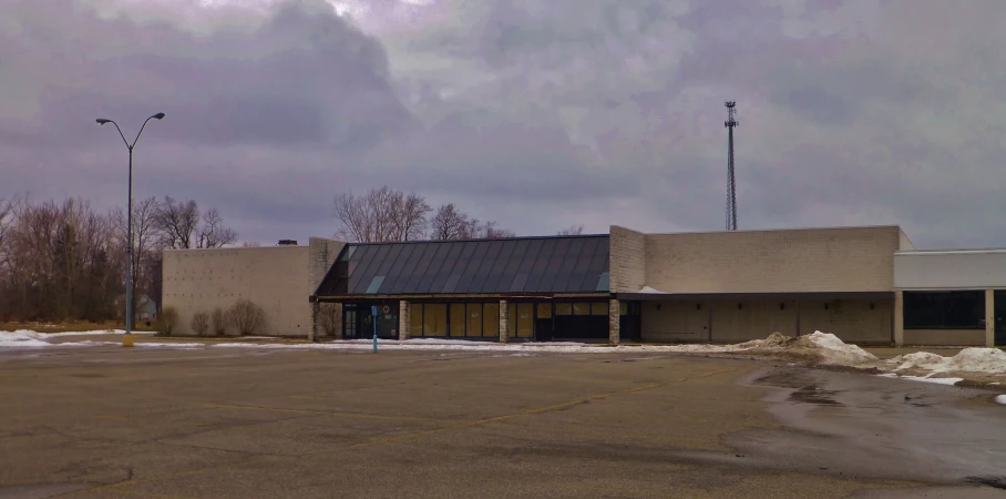 a commercial building that appears to be under construction on the street