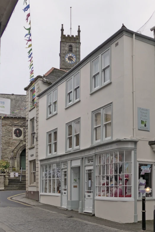 a street corner with two building that is very similar