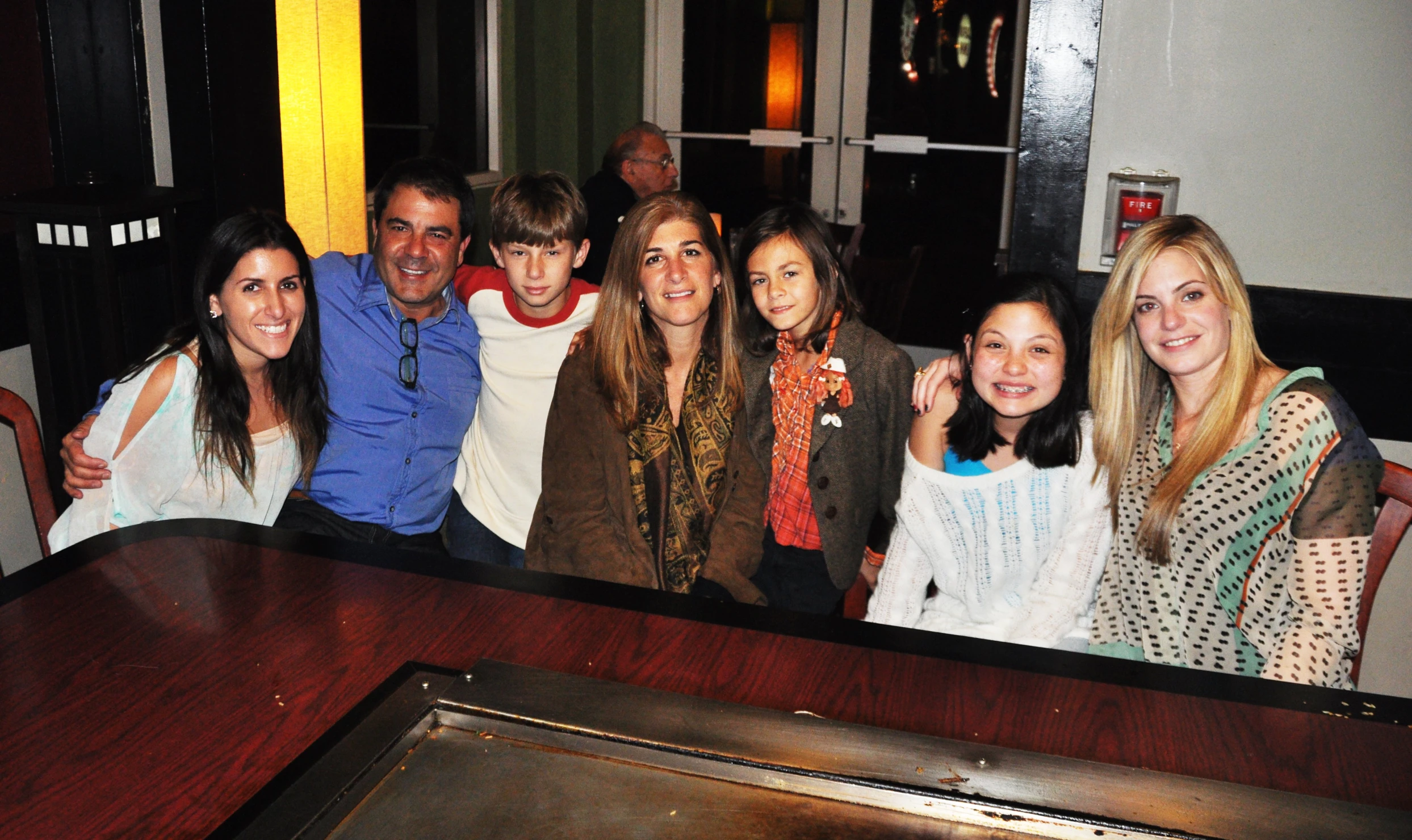 the group of people are all smiling and posing for a po