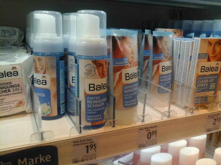a display in a store filled with containers of balee cream
