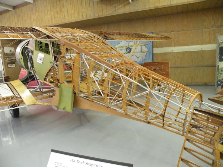 a model of a wooden airplane made from bamboo