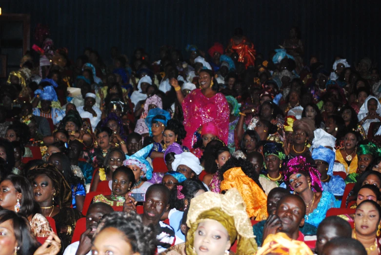 many people in an audience at a convention