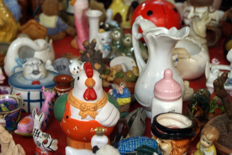 a bunch of ceramic figurines all with clown clown faces