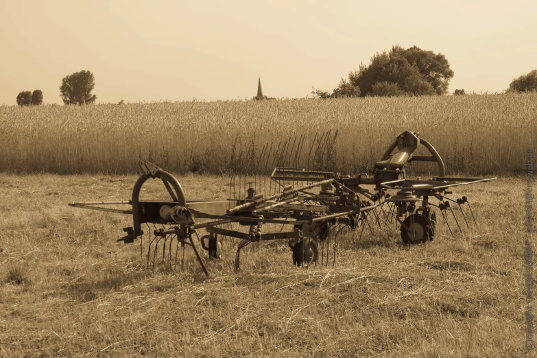 a farmer's culter is sitting in a field