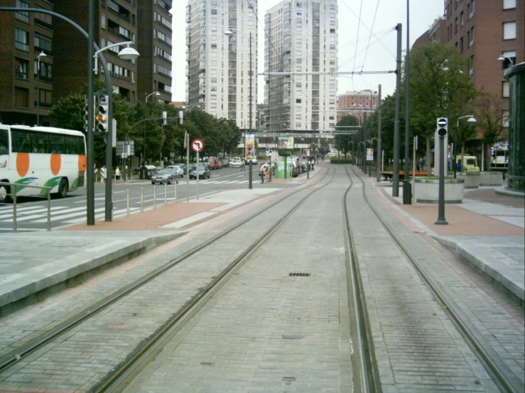 the train tracks are empty in the city