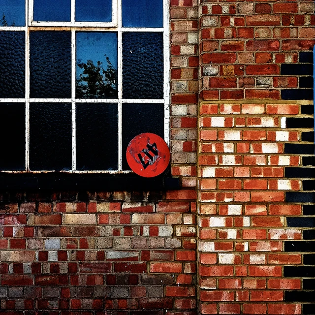 a window with a graffiti on the side of it