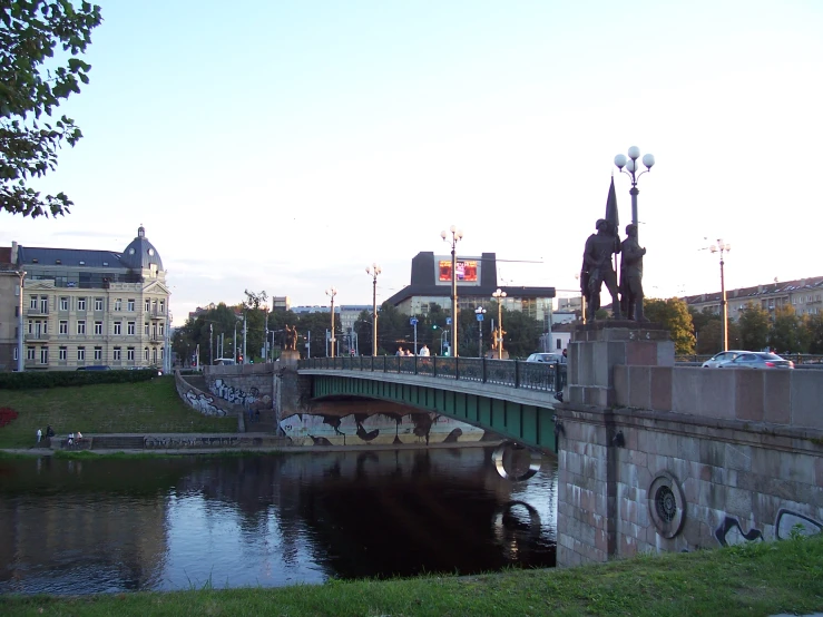 the city has an old bridge crossing a river