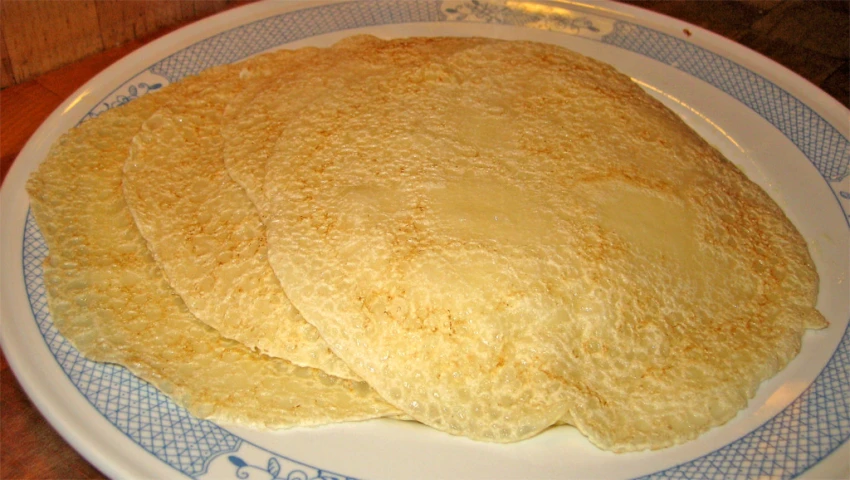 two slices of bread that are sitting on a plate