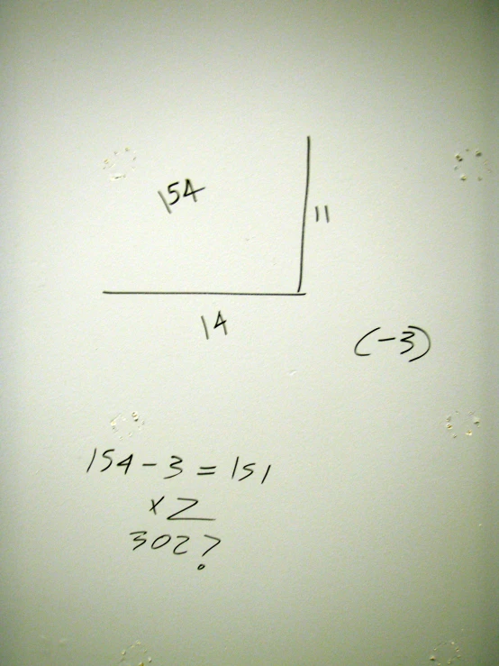 two rectangular numbers are in a square on the fridge door