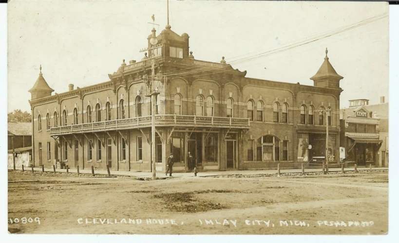 an old building sitting on the corner of a street